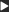 A white triangle is in the middle of a black background.