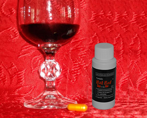 pill_wine A glass of wine and a bottle on the table